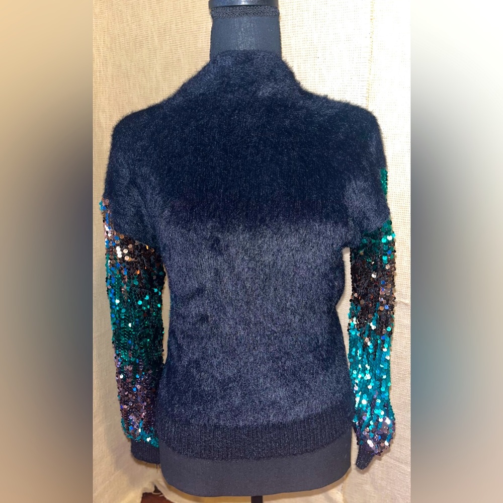 Black fur sweater w/ green and gold sequins sleeves